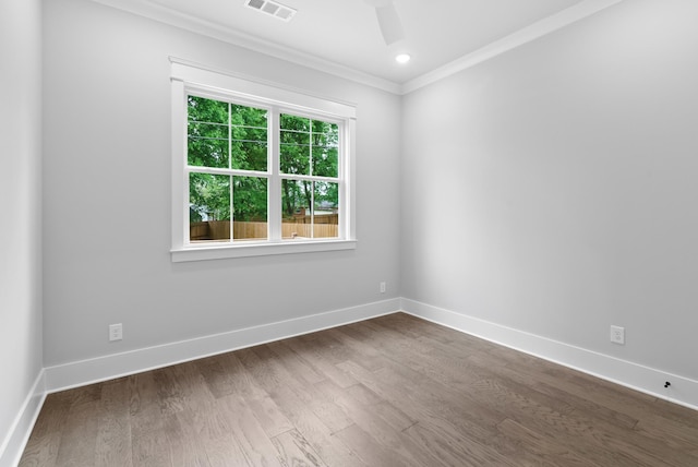 542B Starliner Dr, Nashville, TN 37209 - empty room with crown molding, ceiling fan, dark wood-style flooring, and baseboards