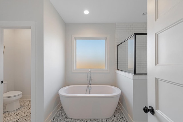 bathroom with tile patterned floors, plus walk in shower, and toilet