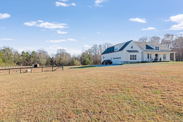 view of yard featuring a garage