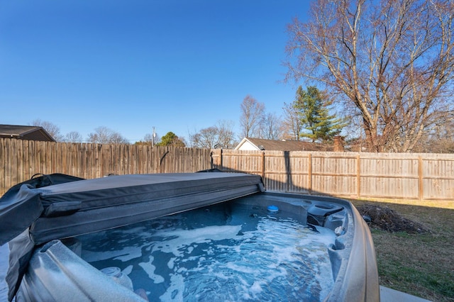 view of pool featuring a hot tub