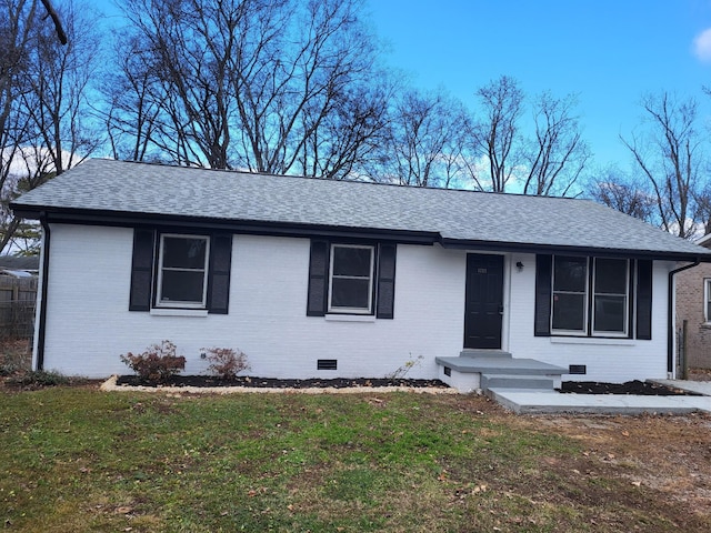 single story home featuring a front lawn