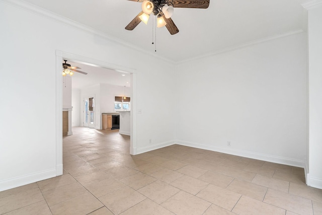 tiled spare room featuring ceiling fan and ornamental molding