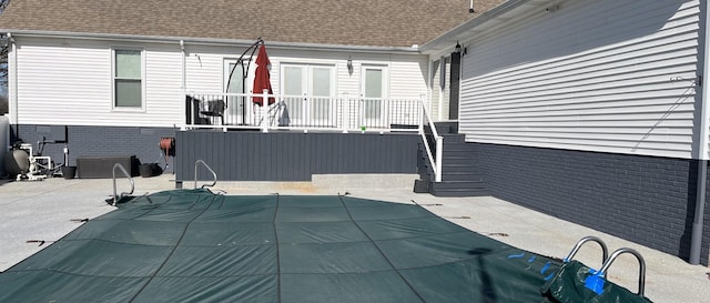 view of patio with a covered pool