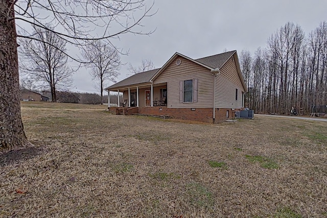 view of front of home featuring central AC unit and covered porch