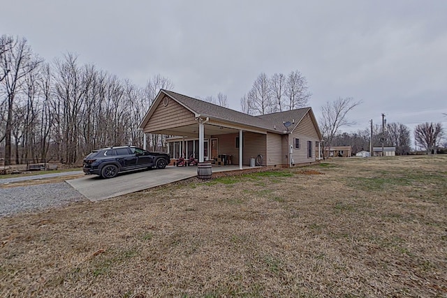 view of side of property featuring a yard