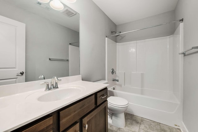 full bathroom with vanity, tile patterned floors,  shower combination, and toilet