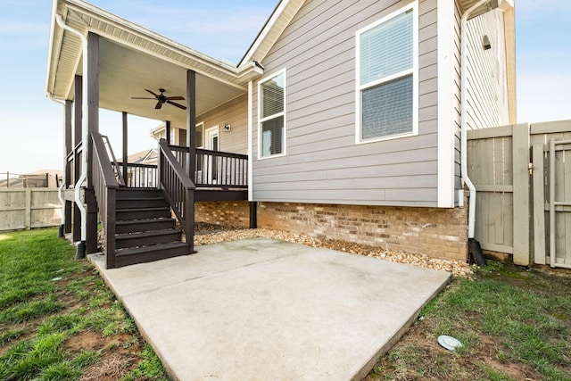 exterior space featuring ceiling fan and a patio area