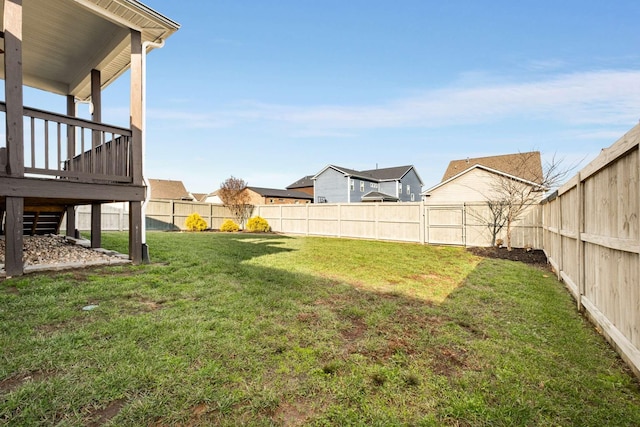 view of yard featuring a wooden deck