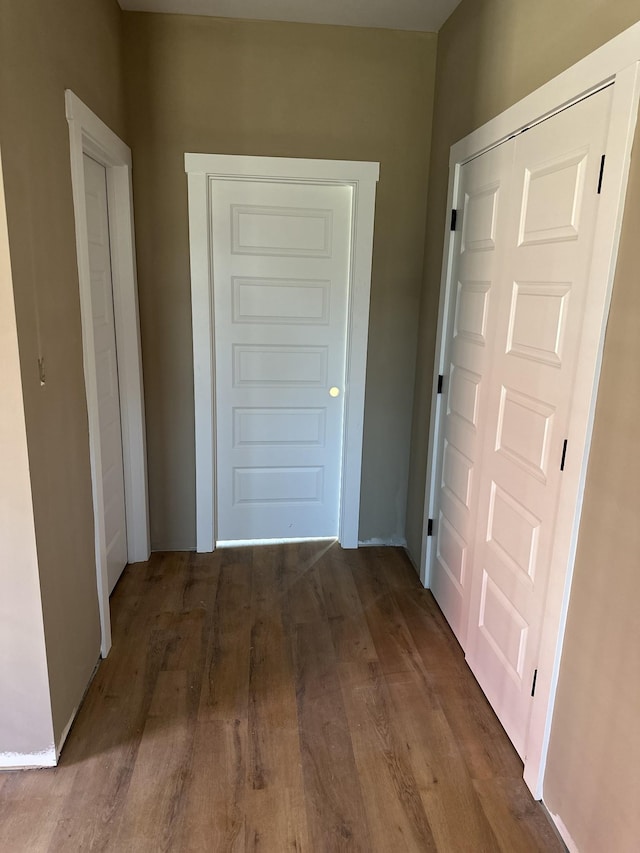 corridor with wood finished floors