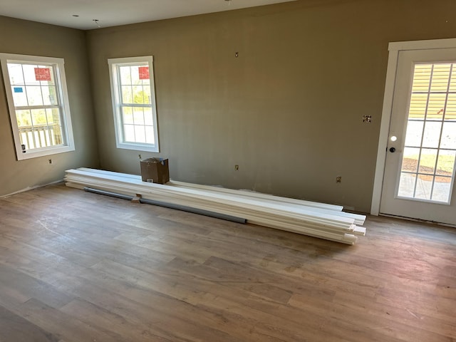 empty room with wood finished floors