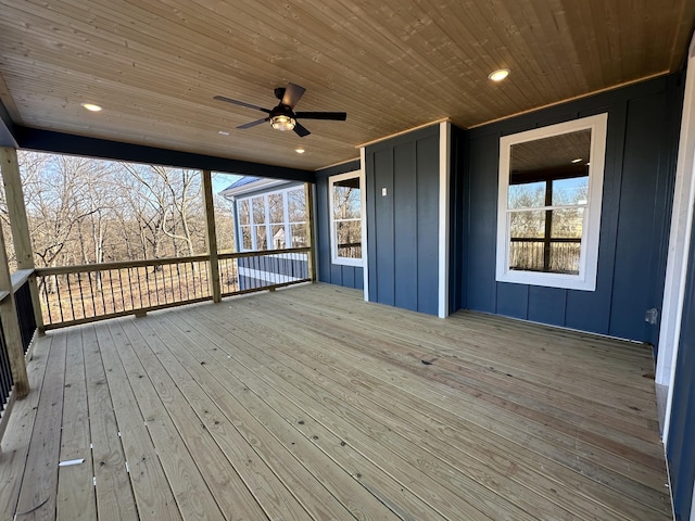 wooden terrace featuring ceiling fan