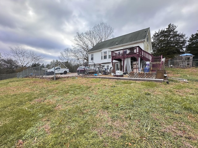 view of yard featuring a wooden deck