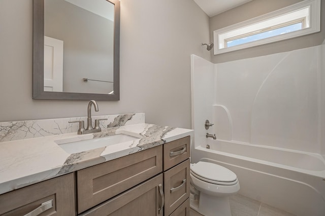 full bathroom featuring shower / bathing tub combination, vanity, toilet, and tile patterned flooring