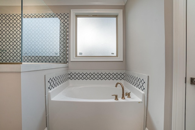 bathroom featuring a tub