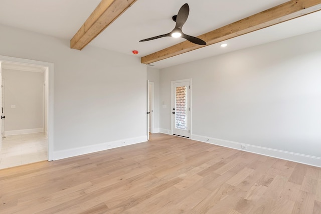 empty room featuring ceiling fan, beam ceiling, and light hardwood / wood-style floors