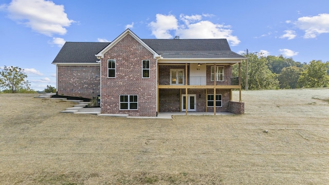 rear view of house featuring a patio area