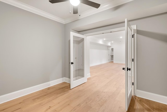 unfurnished room with light wood-type flooring, ceiling fan, and ornamental molding