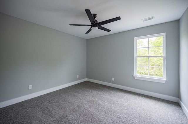 carpeted empty room with ceiling fan