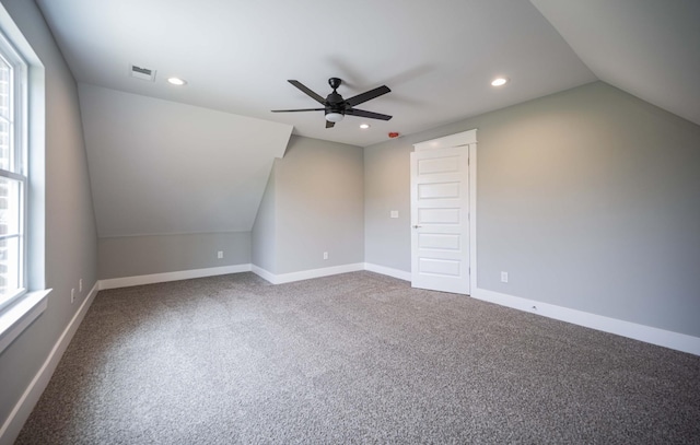 bonus room featuring ceiling fan, carpet floors, and lofted ceiling