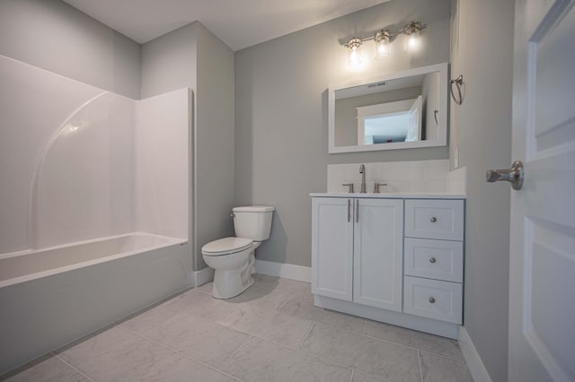 full bathroom with vanity, toilet, and  shower combination