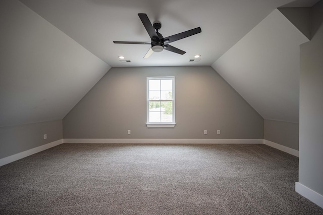 bonus room with ceiling fan, carpet floors, and vaulted ceiling