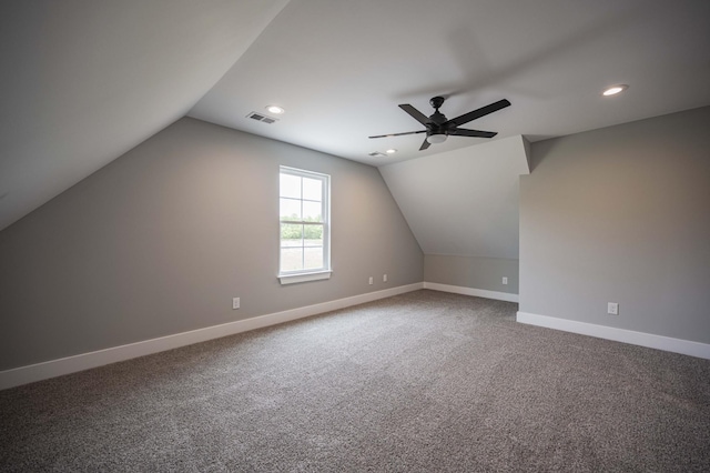 bonus room with carpet flooring, ceiling fan, and lofted ceiling