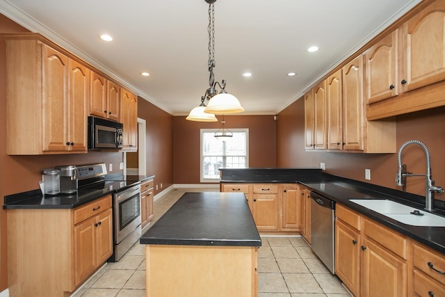 kitchen with appliances with stainless steel finishes, crown molding, sink, a kitchen island, and hanging light fixtures