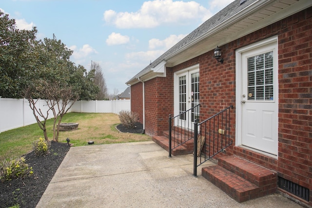 view of patio / terrace featuring an outdoor fire pit