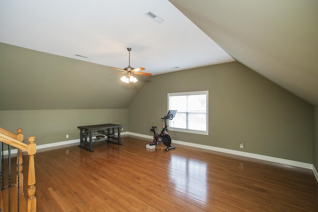 bonus room featuring vaulted ceiling, ceiling fan, and dark hardwood / wood-style floors