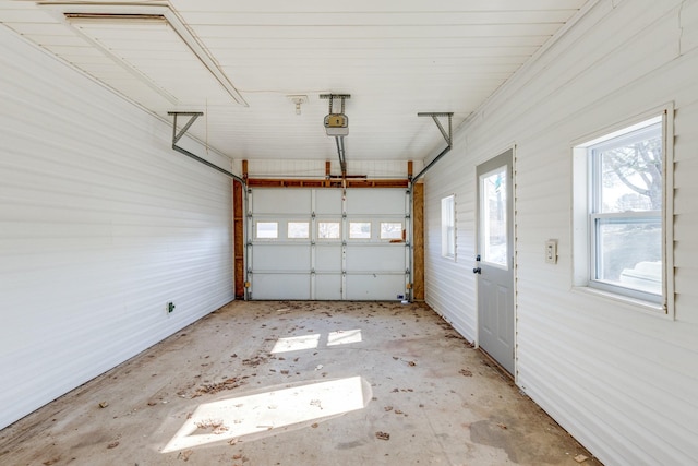 garage featuring a garage door opener