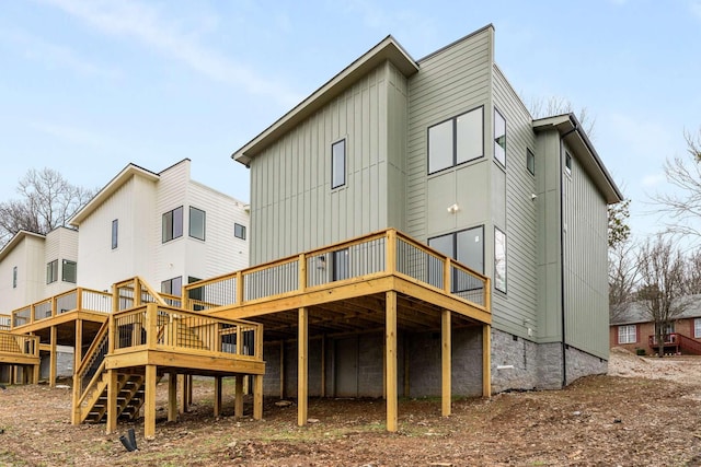 back of property featuring a wooden deck