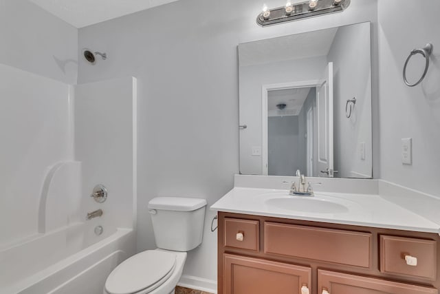 full bathroom with a textured ceiling, vanity,  shower combination, and toilet