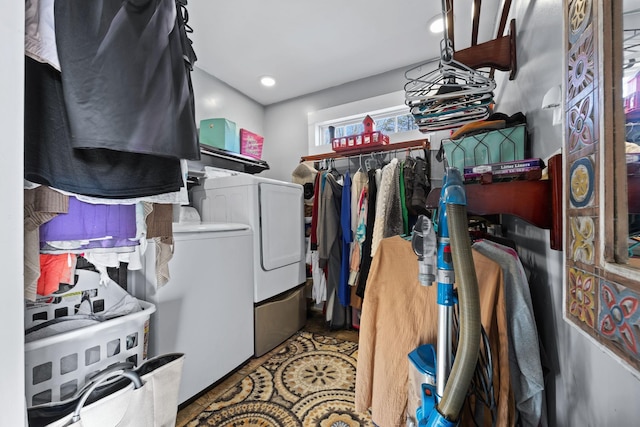 laundry room with washing machine and clothes dryer