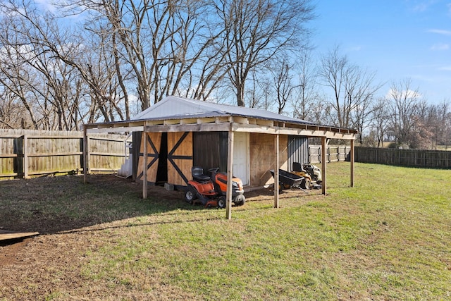 view of outdoor structure with a lawn