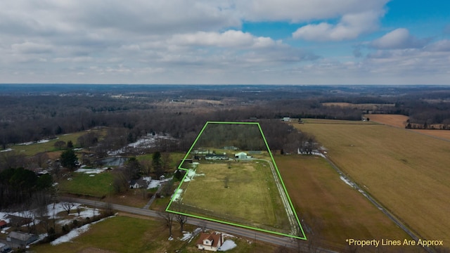 birds eye view of property with a rural view