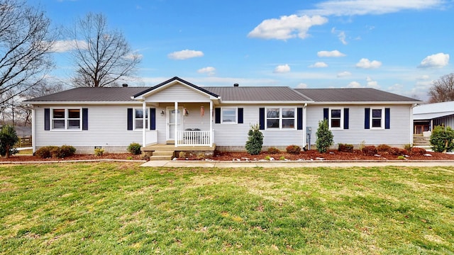 single story home featuring a front yard and covered porch