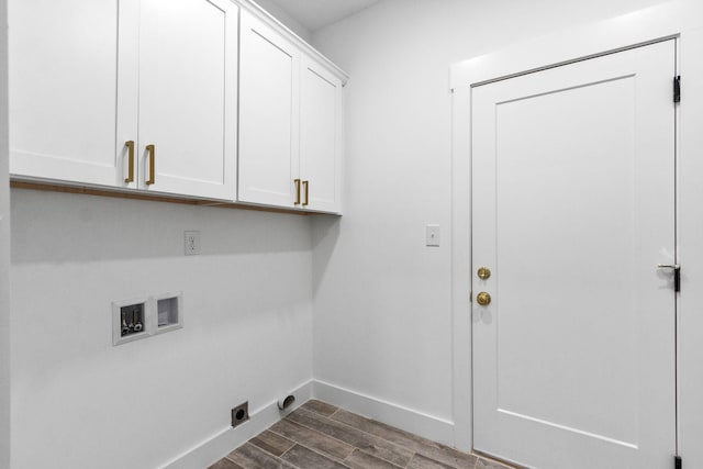 clothes washing area featuring cabinets, dark wood-type flooring, and hookup for a washing machine