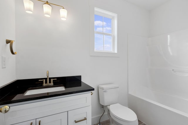 full bathroom featuring vanity, toilet, and tub / shower combination