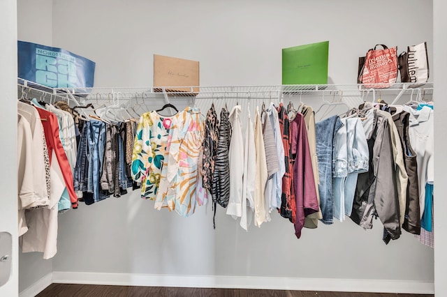 walk in closet featuring hardwood / wood-style flooring