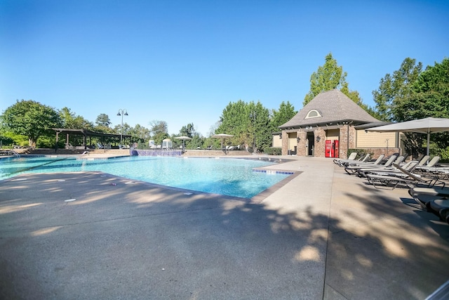 view of swimming pool featuring a patio