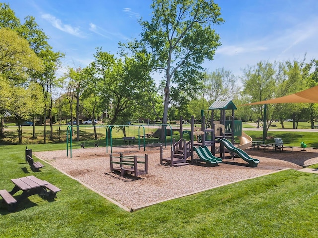 view of playground with a yard