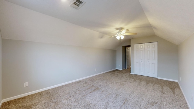 bonus room with carpet, ceiling fan, and lofted ceiling