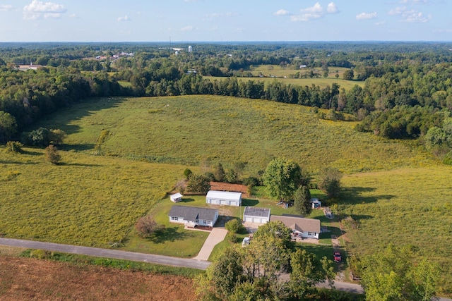 birds eye view of property with a rural view