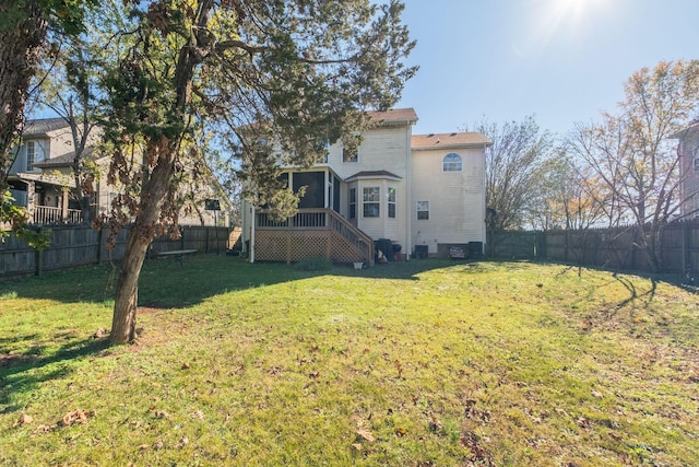 view of yard featuring a sunroom