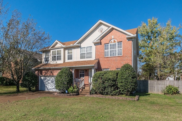 view of front of property featuring a front yard and a garage