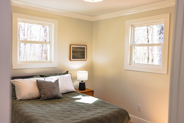 bedroom with ornamental molding