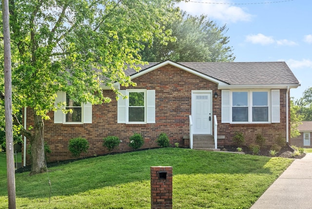 view of front of property with a front yard