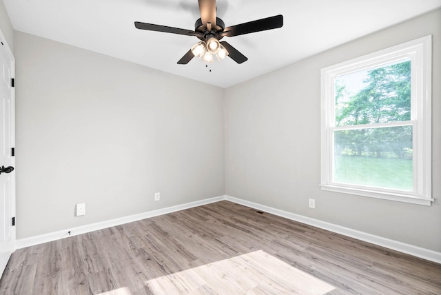 unfurnished room featuring ceiling fan and light hardwood / wood-style flooring