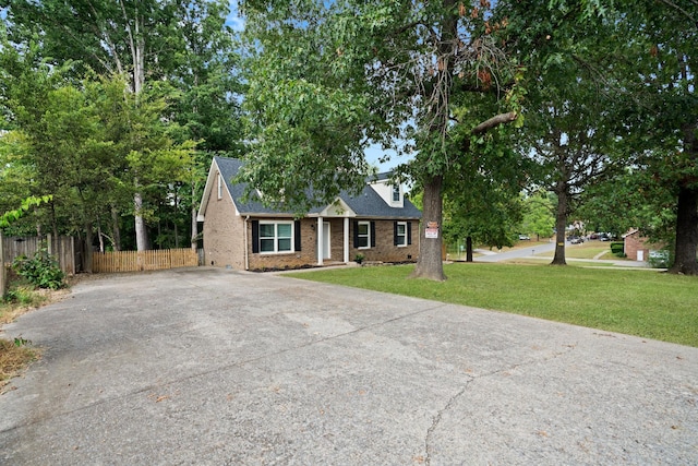 view of front of property with a front lawn