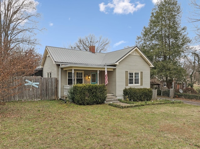 view of front of home with a front lawn